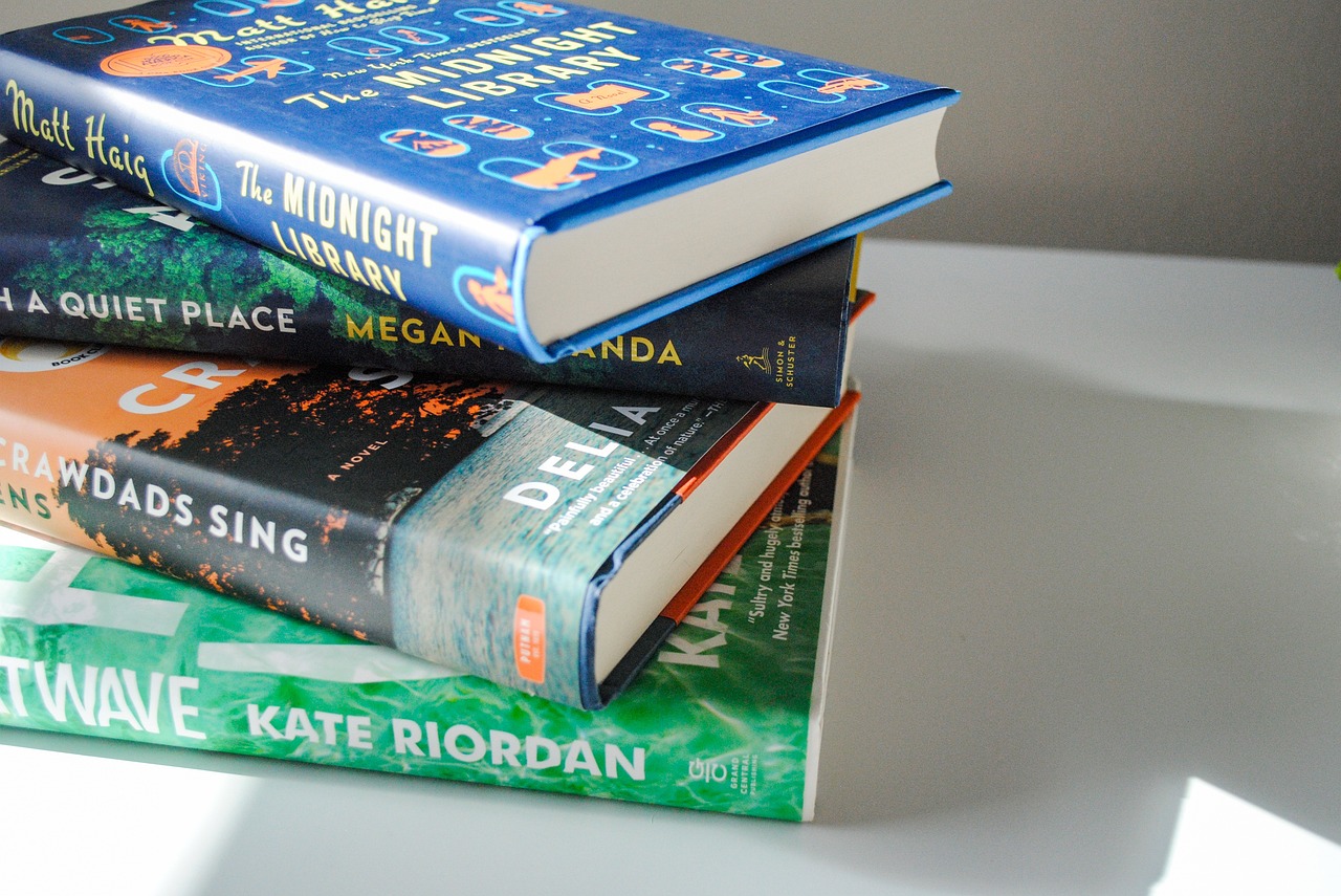 A pile of four bestselling novels